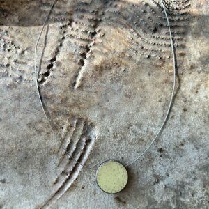 Stainless steel necklace with green concrete pendant